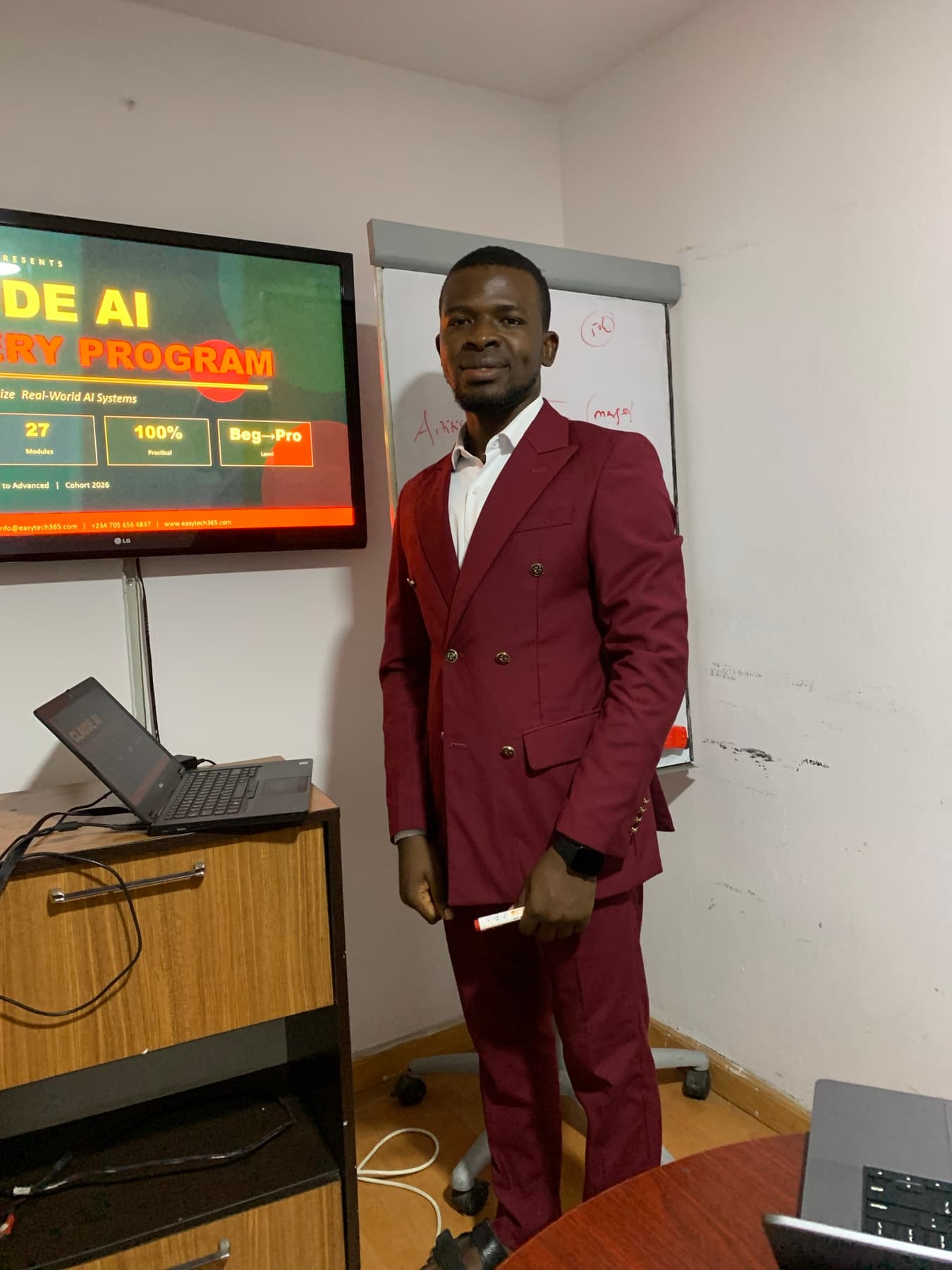 Israel Afolabi presenting the Inside AI Mastery Program to a training room
